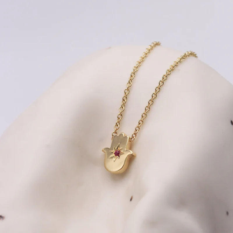 Your Perfect Accessory Now At The Best Price Floating Hamsa gold necklace with gem stone