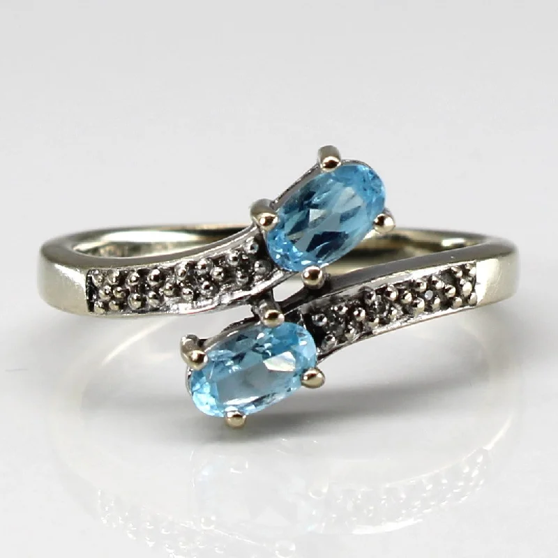 Celebrate With Sparkle – Jewelry Sale Now Live Topaz & Diamond Bypass Ring | 0.50ctw | 0.02ctw | SZ 5.5 |
