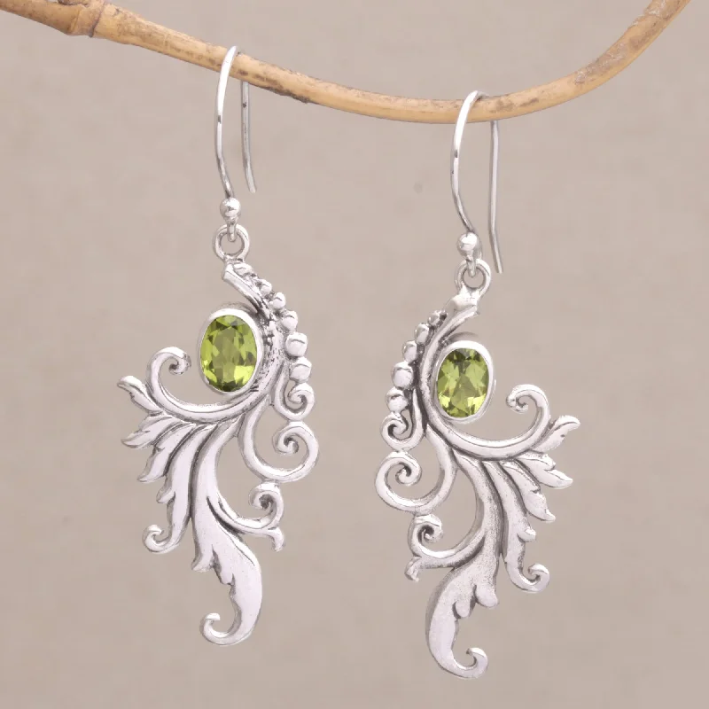 Make Your Outfit Shine With Discounted Jewelry By the Wind Peridot and Sterling Silver Dangle Earrings from Bali