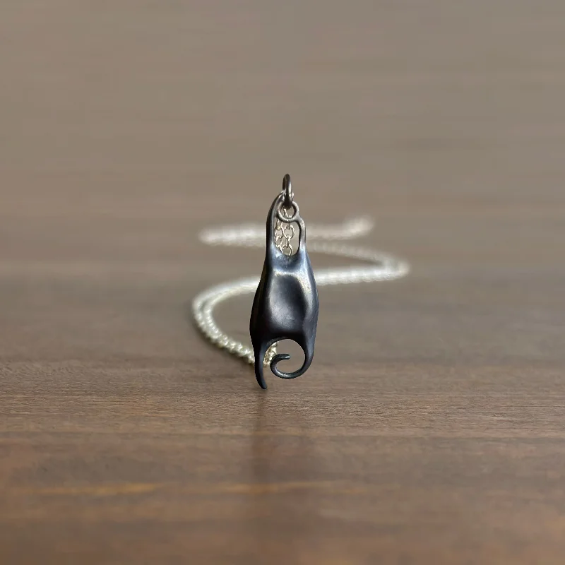 Little Silver Skate Egg Pendant