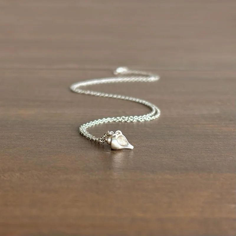 Tiny Silver Whelk Shell Ruthie B. Necklace