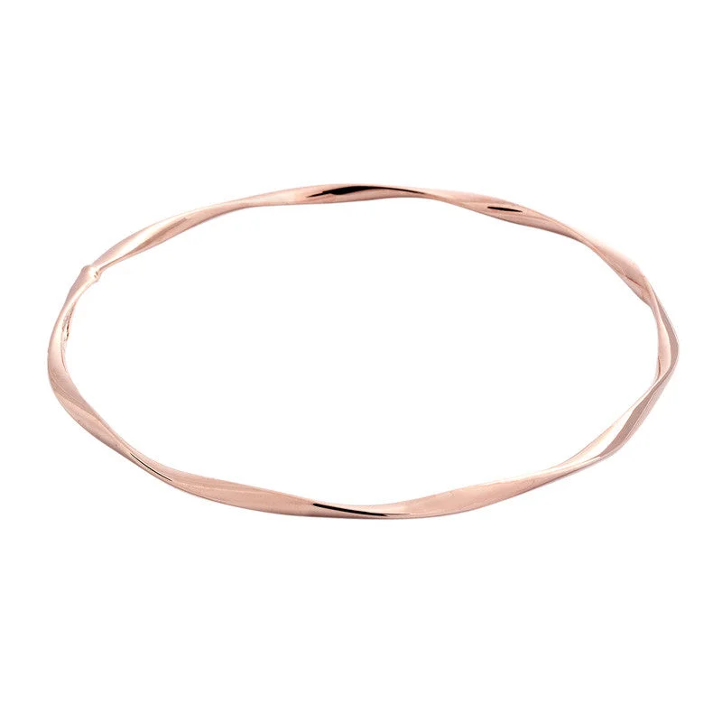 Trending Jewelry Now Available At Exclusive Prices 14 Karat Rose Gold Twisted Slip-on Bangle Trending Jewelry Now Available At Exclusive Prices 14 Karat Rose Gold Twisted Slip-on Bangle