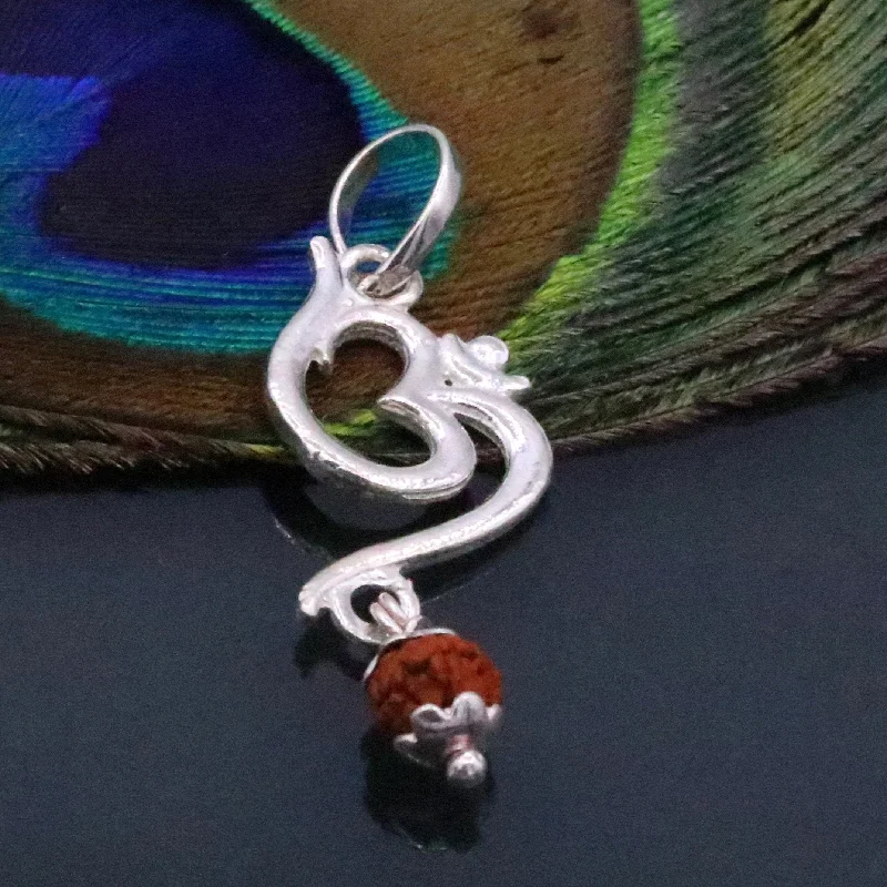 Luxury Jewelry Without The Luxury Price Tag Fabulous Aum pendant with real rudraksha beads solid silver pendant unisex jewelry tribal jewelry from Rajasthan india nsp93